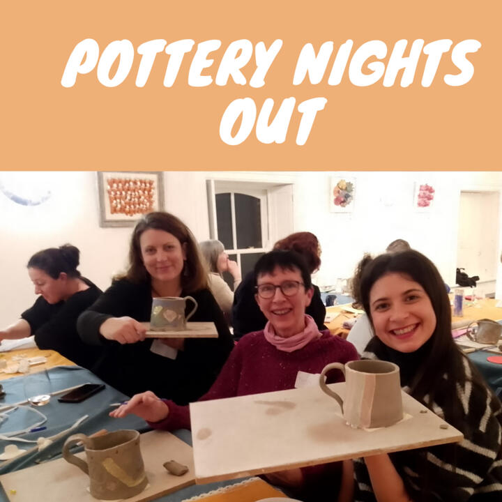 Pottery Night Out Three women smiling and showing their unfired clay mugs made during a pottery workshop