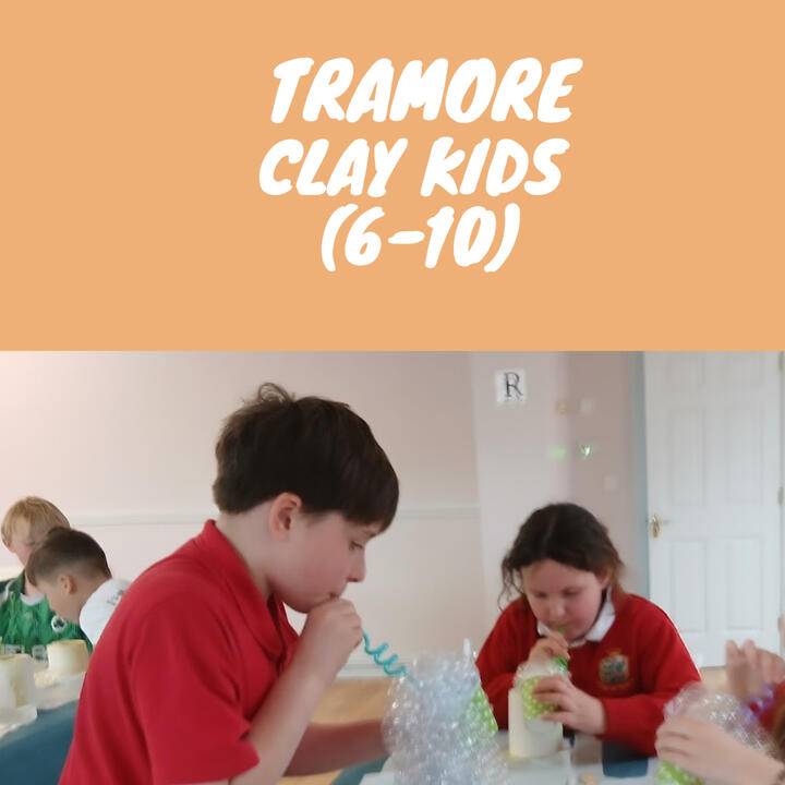 Kids Pottery Classes Children blowing glaze onto bisque ceramics